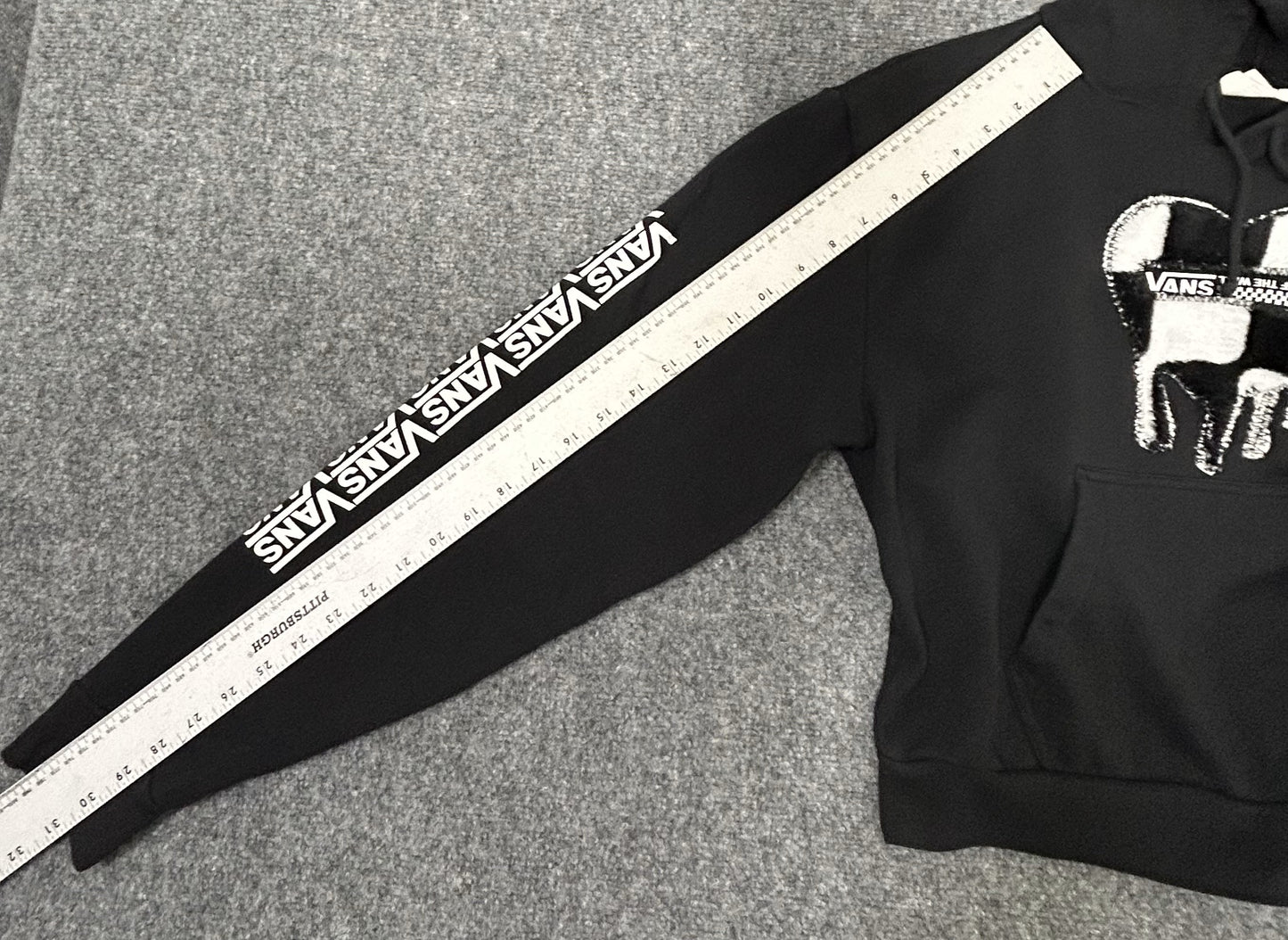 Handmade Checkered Patch on Reworked Vans Women's L Black Ribbed Sleeves